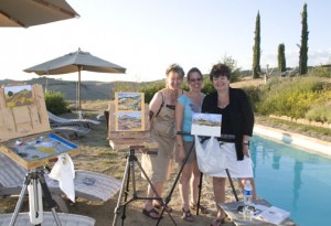 girls paintings by pool Tuscany art trek